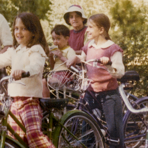 Brené and Eleanor riding bikes as kids.