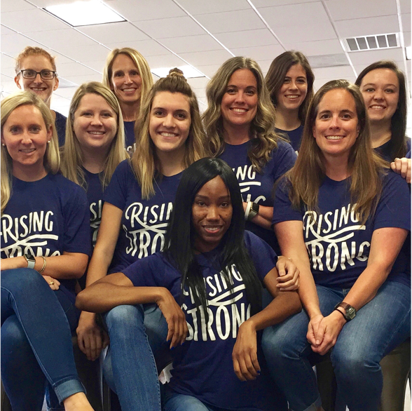 Group photo of the BBEARG team wearing matching Rising Strong shirts to celebrate the books Release.